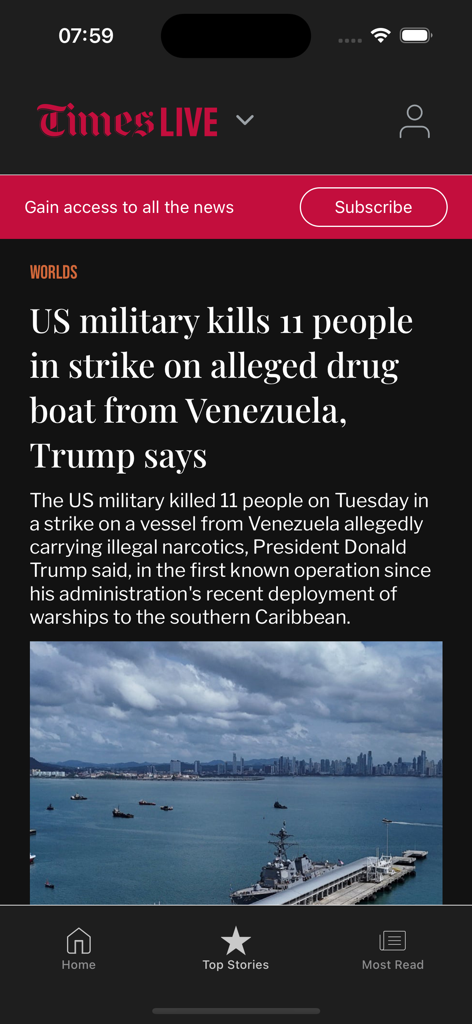 TimesLIVE - Screenshot of the TimesLIVE app displaying a world news article headline and a military ship image.
