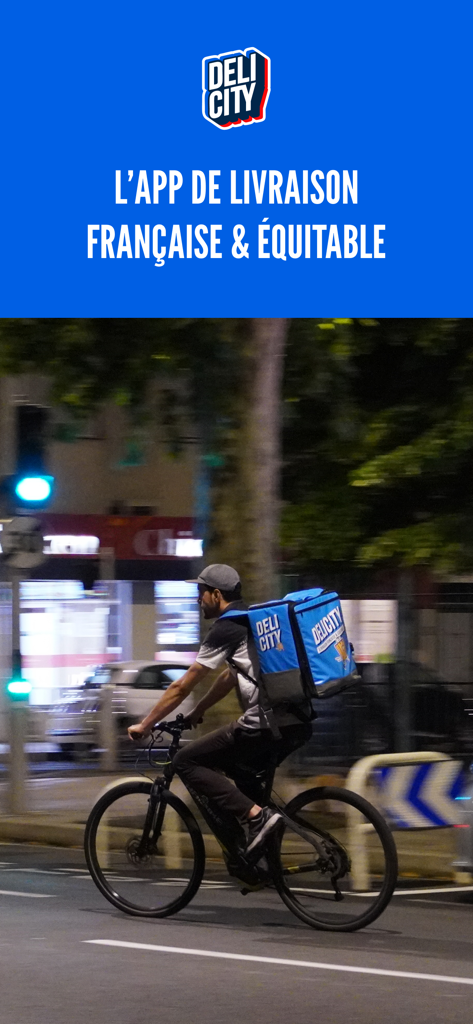 Delicity - A Delicity delivery person on a bicycle at night with a branded thermal backpack