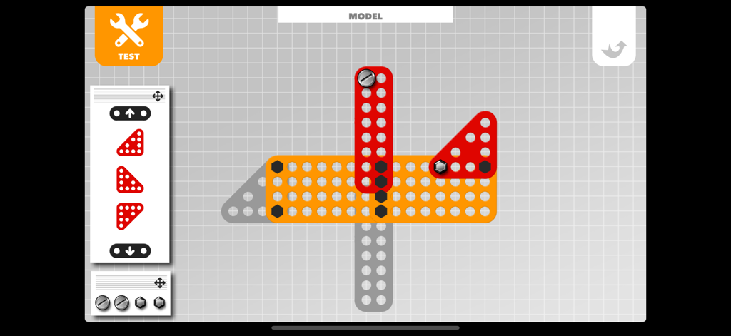 Mecanic - Interfaccia dell'app Mecanic che mostra un bambino che costruisce un modello con piastre e viti colorate su uno sfondo a griglia