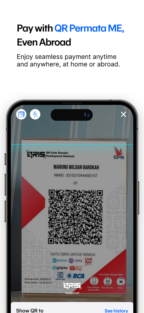 Permata ME - A smartphone using the Permata ME app to scan a QRIS code for seamless international payments