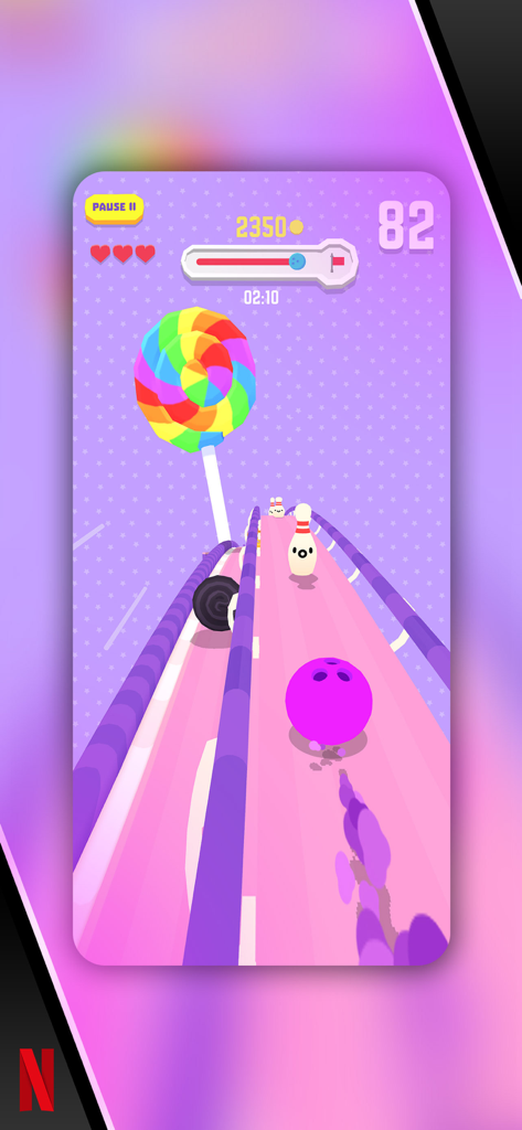 Bowling Ballers - 볼링 볼러스에서 다채로운 사탕 테마의 트랙을 따라 굴러가는 분홍색 볼링공