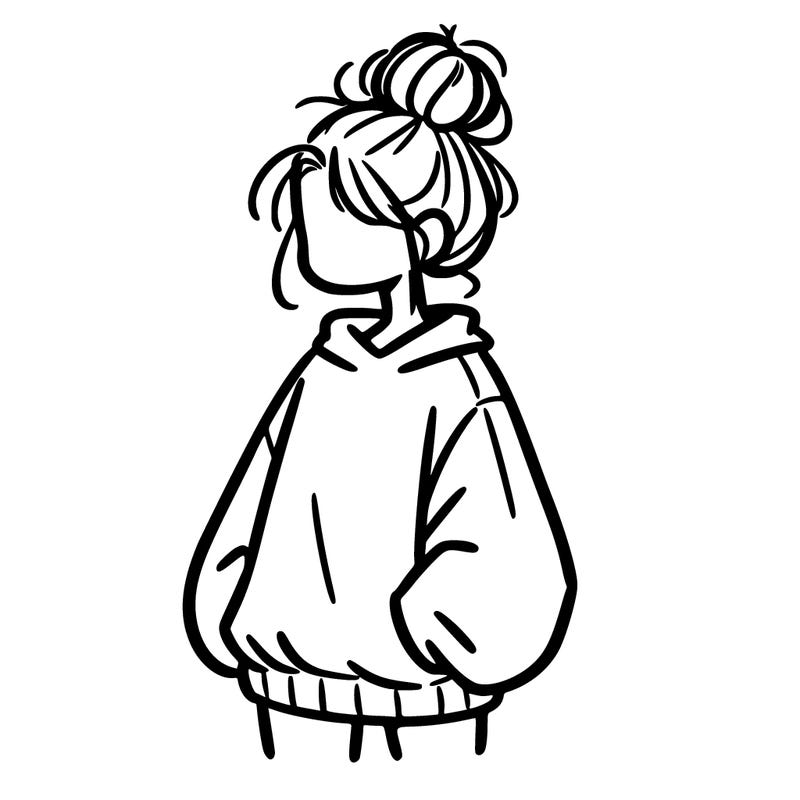 girl with baggy sweatshirt and messy bun