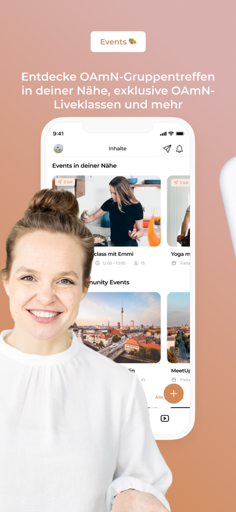 A woman smiling in front of a smartphone screen showing local community events and sobriety classes on the OAMN app