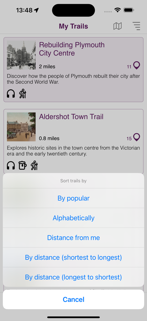 The My Trails screen in the Places and Trails app showing historical tour options and a pop up menu for sorting trails by distance and popularity