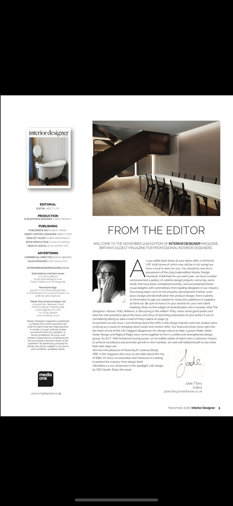 Mise en page numérique de la page 'From the Editor' de l'application Interior Designer Magazine, montrant un design architectural moderne.