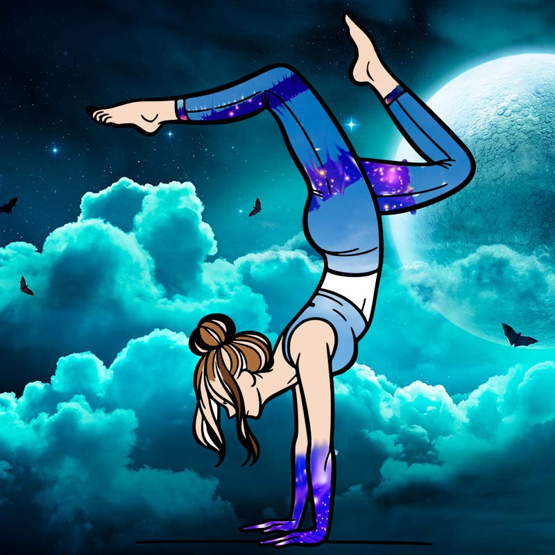 a woman doing a handstand