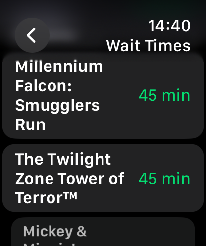 Queue Kingdom - Queue Kingdom Apple Watch interface showing live ride wait times for Millennium Falcon and Tower of Terror at Disney parks.