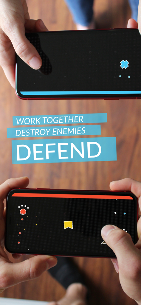 DUAL! - Dos personas jugando al modo cooperativo multijugador Defend en sus teléfonos móviles