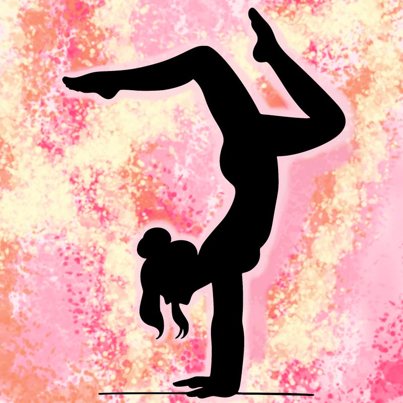 a woman doing a handstand