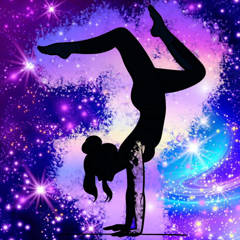 a woman doing a handstand