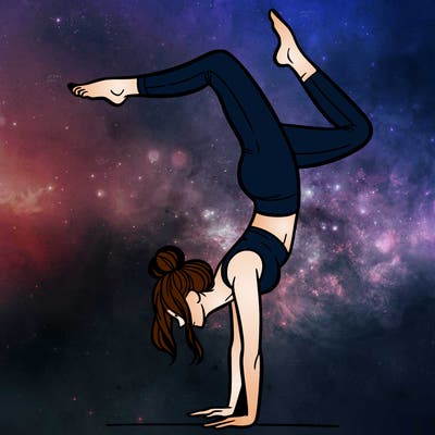 a woman doing a handstand