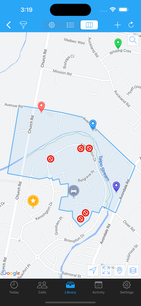 ServicePlanner mobile app map view showing a highlighted territory area and custom location markers