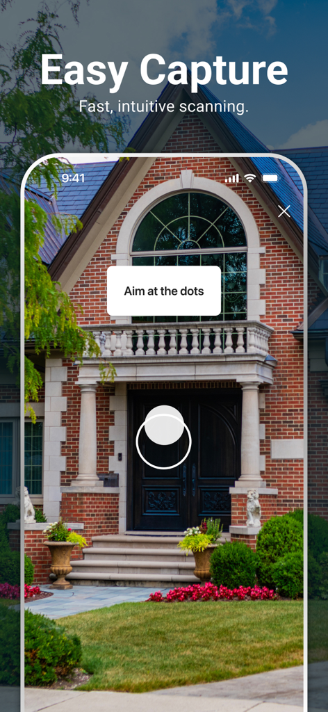 Matterport for Governmentアプリのインターフェース。レンガ造りの建物の外観の3Dキャプチャと、ドットを狙うように促すプロンプトが表示されています。