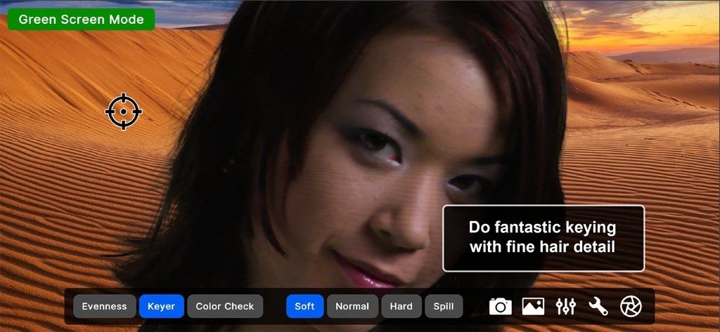 Green Screener - Green Screenerアプリで、プロフェッショナルな髪のディテールを示す、砂漠の背景にキーイングされた女性の顔。