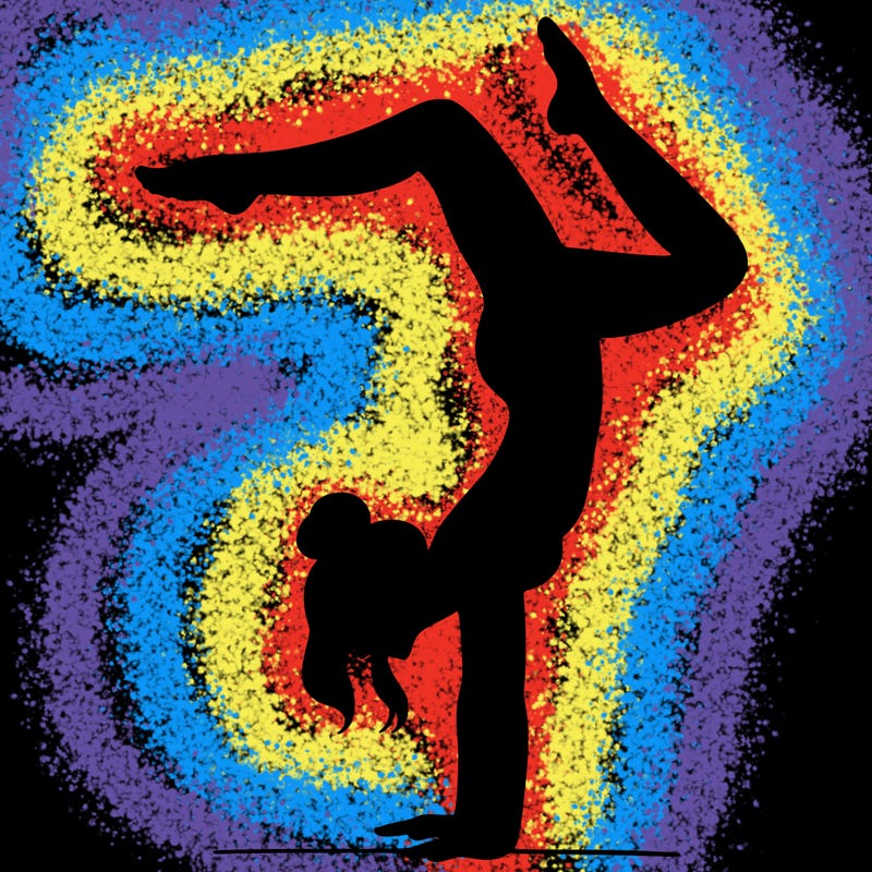 a woman doing a handstand