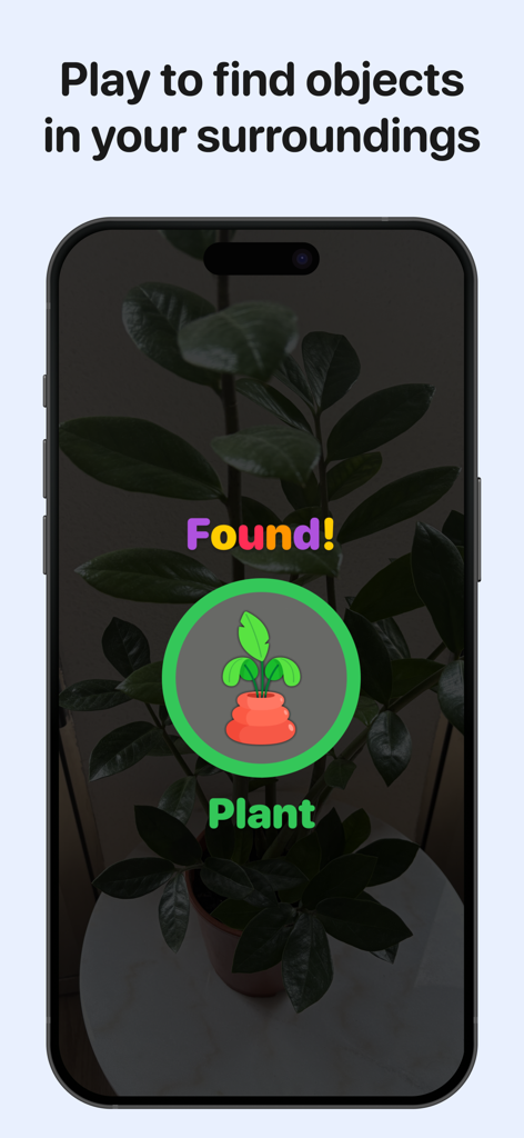 Interfaz de la aplicación Lingokids Town mostrando la función de reconocimiento de objetos identificando una planta de interior real