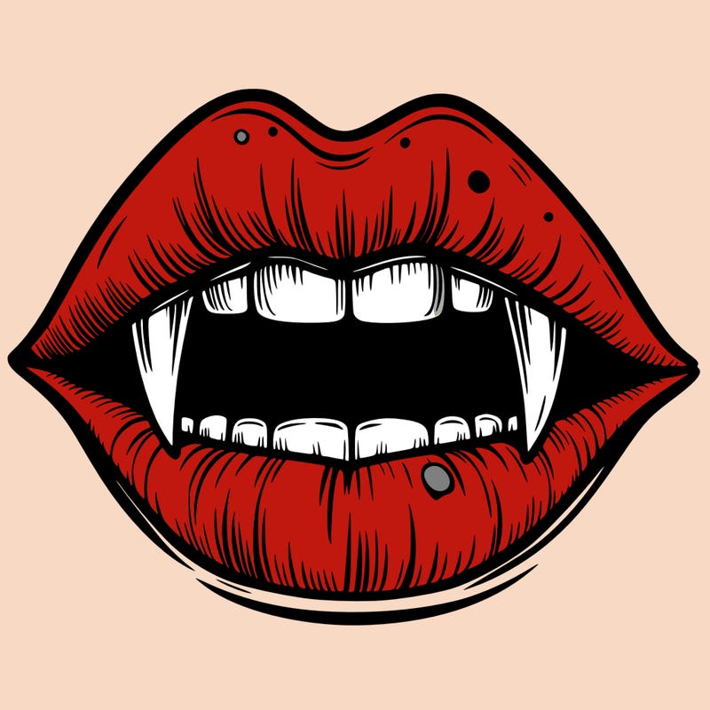 lips with vampire teeth