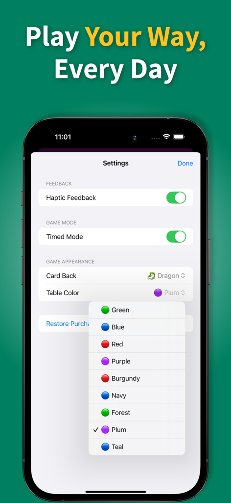 Aces Up Solitaire settings screen on a smartphone showing haptic feedback and timed mode toggles with a dropdown menu to choose a plum table color.