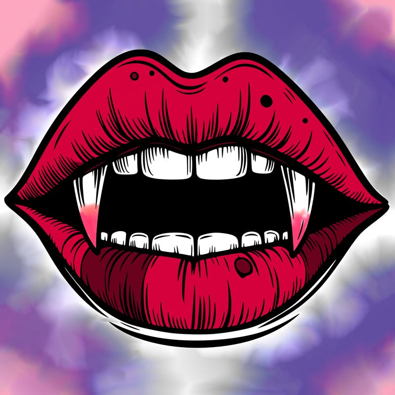 lips with vampire teeth