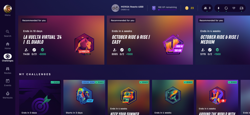 ROUVY indoor cycling app interface showing various virtual cycling challenges and user badges
