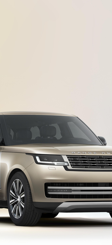 Land Rover Remote - ゴールドのレンジローバーSUVの正面図