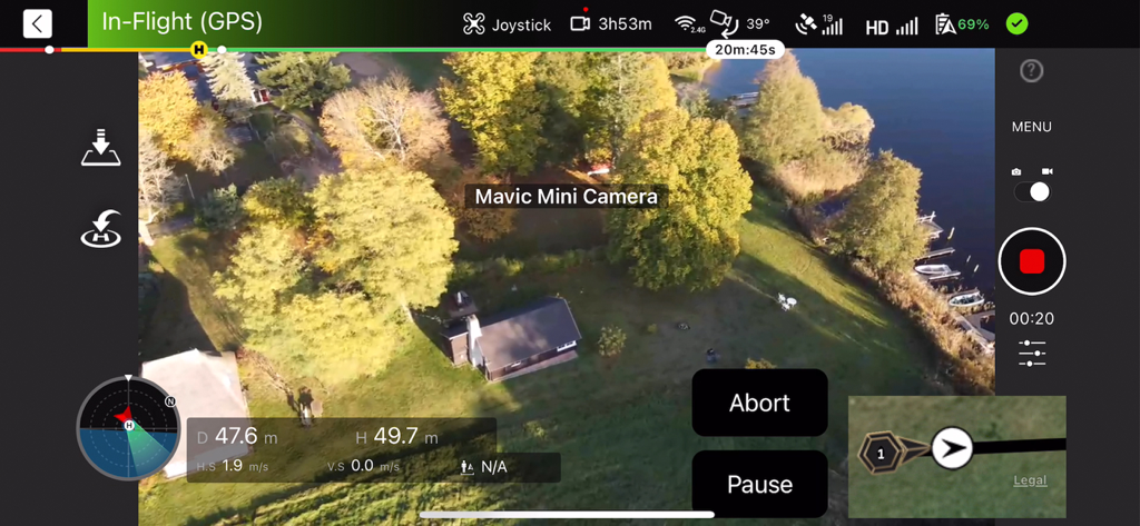 One Click Drone - In-flight interface of the One Click Drone app showing a Mavic Mini camera view and real-time flight telemetry