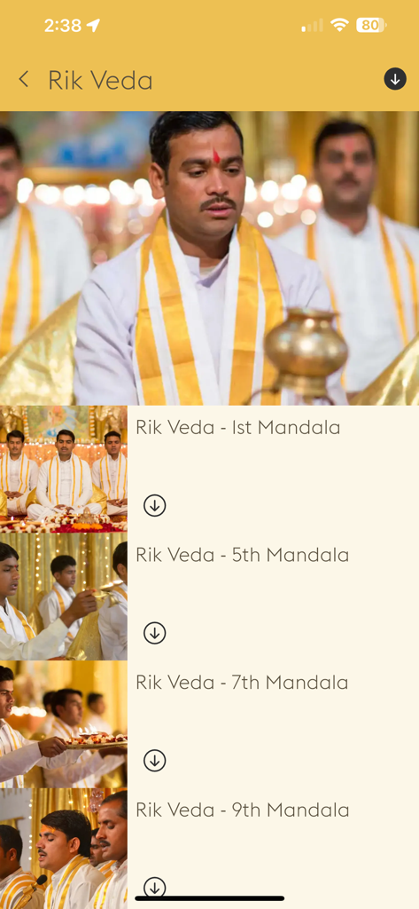 Maharishi Veda - Screenshot of the Maharishi Veda app showing a list of Rik Veda recitations with images of Vedic Pandits