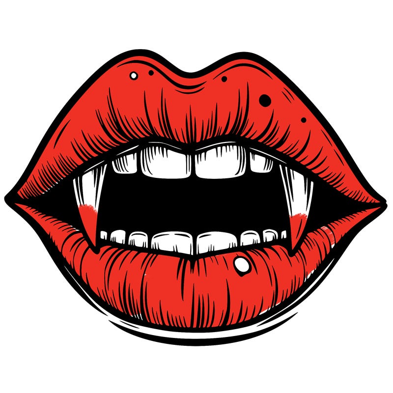 lips with vampire teeth
