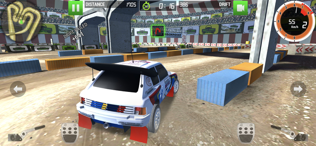 Rally Racer Dirt - A white rally car racing on an indoor dirt track with shipping container obstacles and game UI elements.