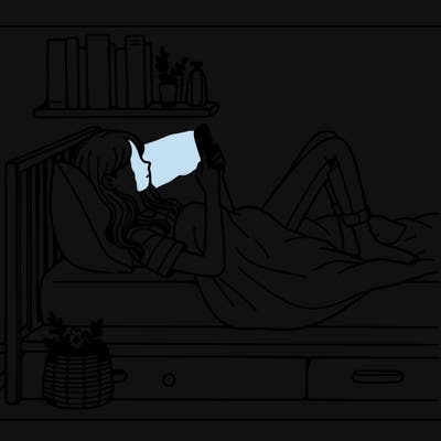a girl laying on her bed with her phone