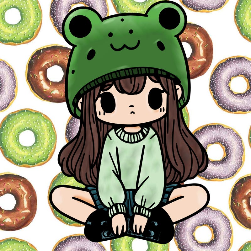 a girl wearing a frog hat and some frog socks