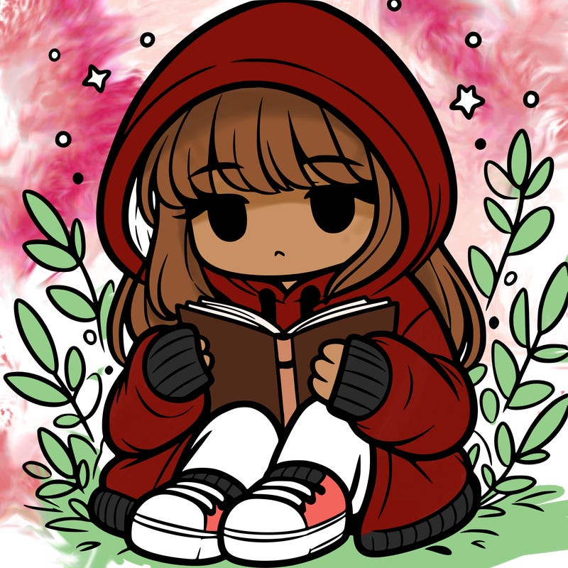 girl in oversized hoodie reading a book