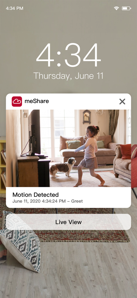 meShare - Uma notificação de smartphone do aplicativo meShare mostrando um alerta de movimento com uma prévia da câmera de uma criança e um cachorro em uma sala de estar