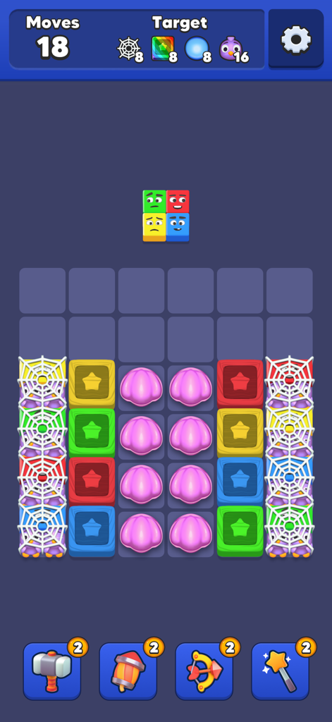 Gameplay screen of Drop Jelly showing colorful blocks and power-up tools
