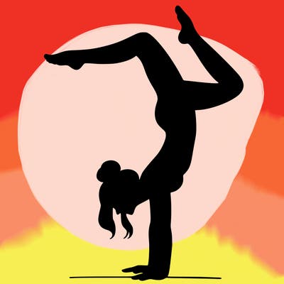 a woman doing a handstand
