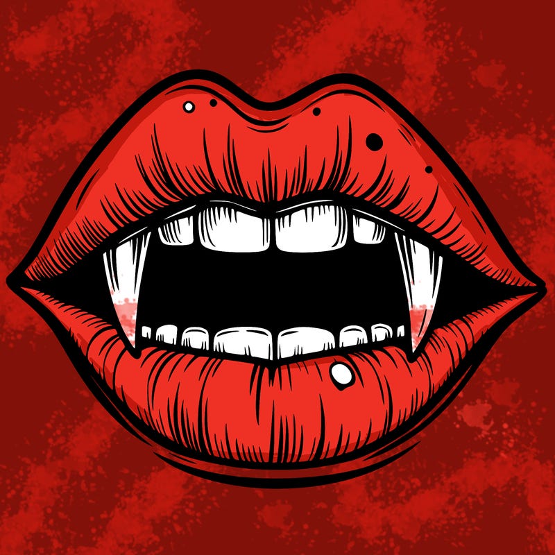 lips with vampire teeth