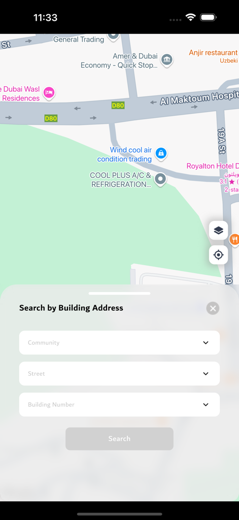 Makani app interface showing a building address search form over a city map