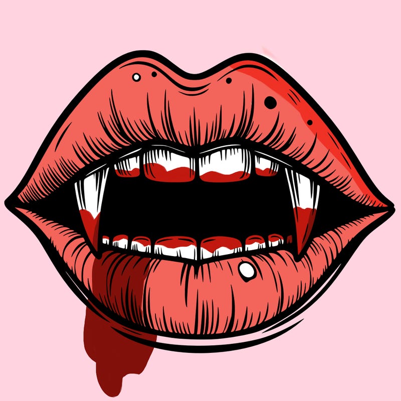 lips with vampire teeth