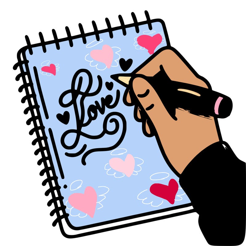a hand writing “love” in calligraphy on a notebook