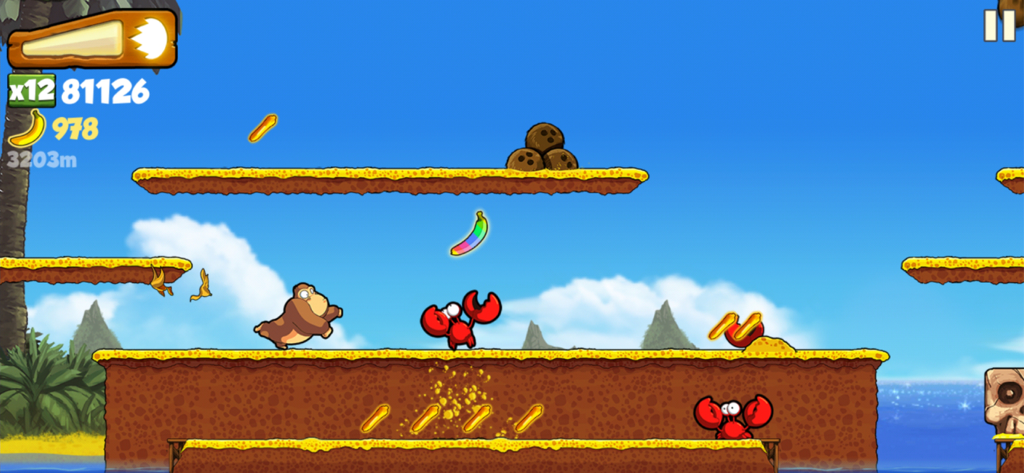 Banana Kong - Banana Kong character running across platforms in a tropical level while collecting bananas and avoiding crabs