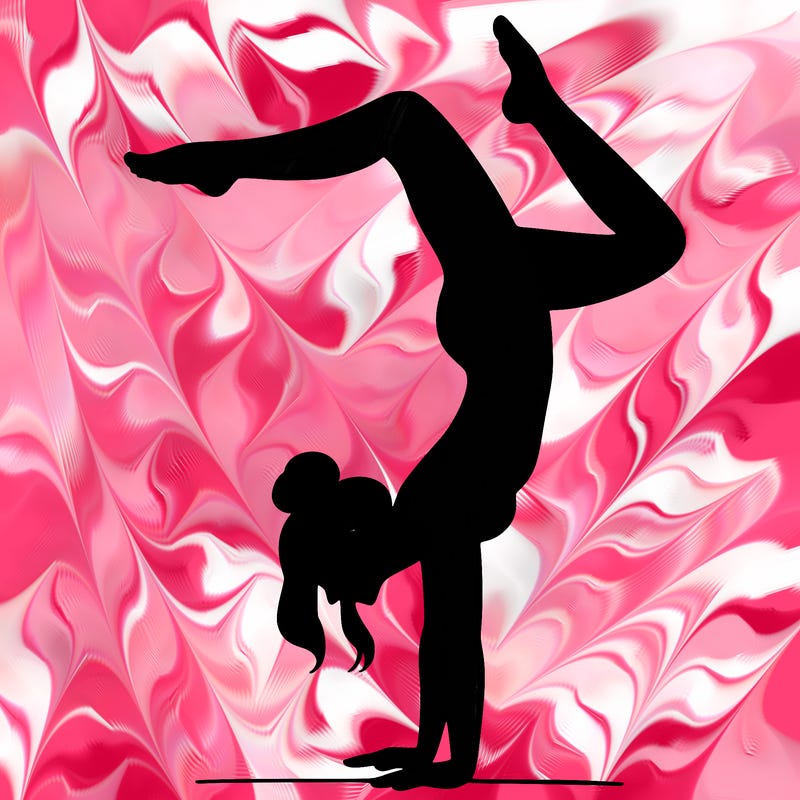 a woman doing a handstand