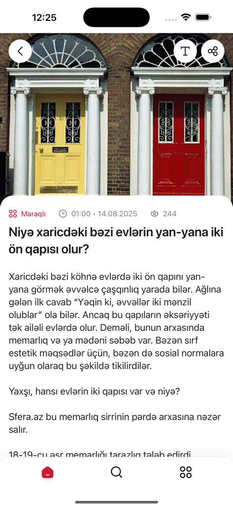 Sfera.az - A screenshot of an article on the Sfera.az news app discussing why some houses have two front doors side by side.