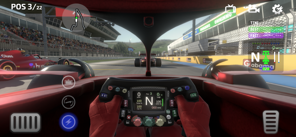 First person cockpit view of an open wheel racing car on a professional track