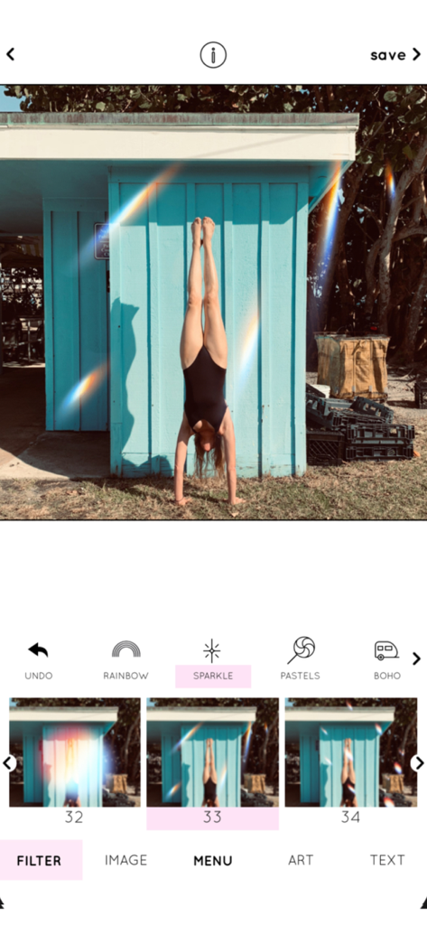 Rainbow Love - A woman doing a handstand with aesthetic rainbow and sparkle filters applied in the Rainbow Love photo editing app