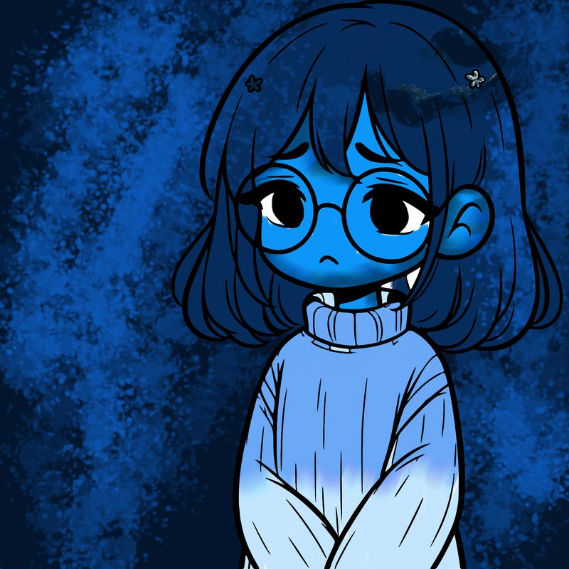 sad girl with glasses in a sweater
