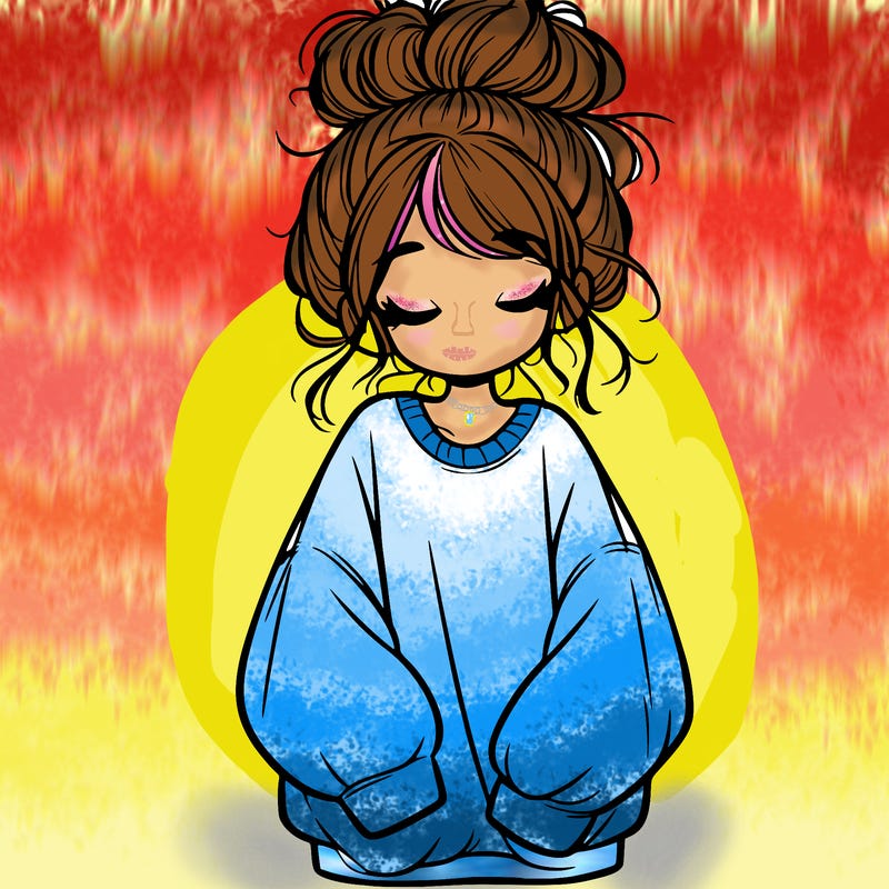 girl with baggy sweatshirt and messy bun