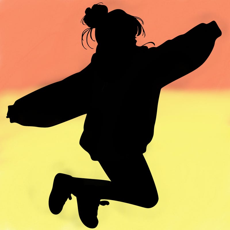 realistic girl jumping with a bun and oversized sweatshirt