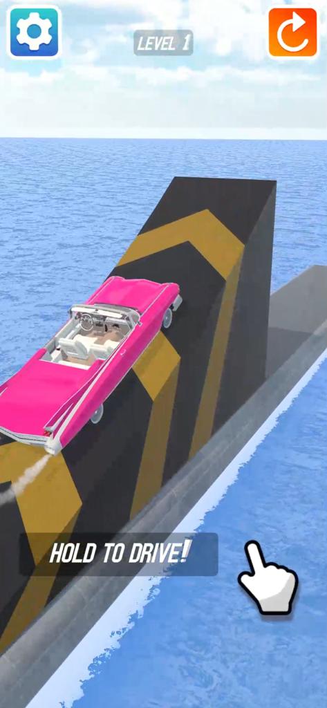Crash Master 3D - A pink classic car driving up a steep ramp over water in a 3D driving game.