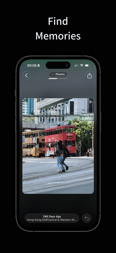 Pantalla del iPhone mostrando la interfaz de la aplicación linger con una foto de una calle en Hong Kong y el subtítulo Encontrar Recuerdos