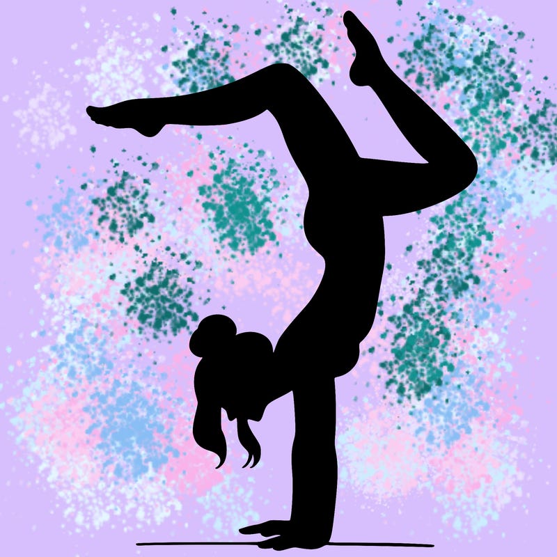 a woman doing a handstand